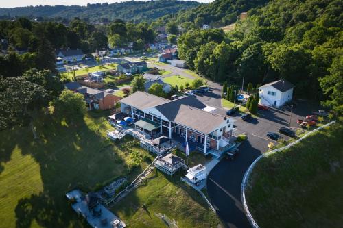 an aerial view of a house with a yard at Riverboat Inn & Suites in Madison