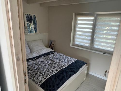 Katil atau katil-katil dalam bilik di Apartament Kłos
