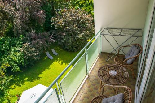 Κήπος έξω από το Hotel Garni Seerösl am Wörthersee , Kärnten