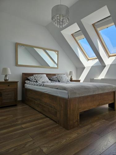 Postel nebo postele na pokoji v ubytování Apartament Platinum