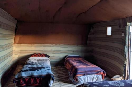 Postel nebo postele na pokoji v ubytování Trekking Desert