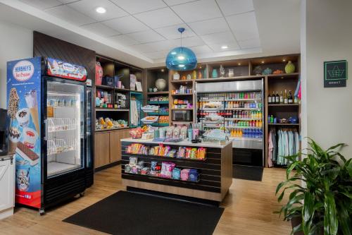 a store with a soda machine in a room at Holiday Inn Resort Oceanfront at Surfside Beach by IHG in Myrtle Beach