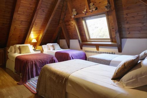 Säng eller sängar i ett rum på Era Garona by FeelFree Rentals