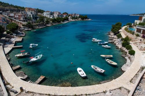 an aerial view of a harbor with boats in the water at Apartments Ivica in Primošten