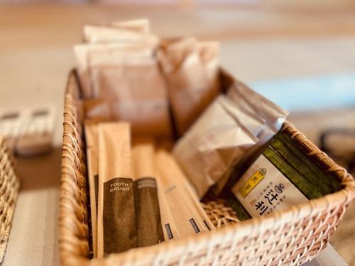 a basket filled with food sitting on a table at Villa 天ツ星 in Tahara