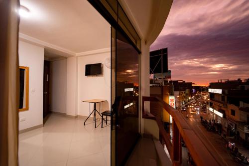 a balcony of a building with a view of a city at Hostal Los Balcones in Nazca