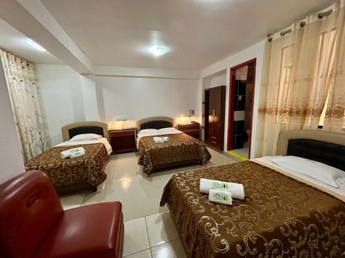 Ένα ή περισσότερα κρεβάτια σε δωμάτιο στο Hotel Residencial Los Tres Pinos