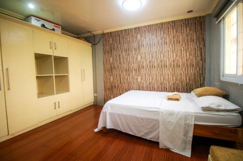 Amor Building - Urdaneta Cityにあるベッド