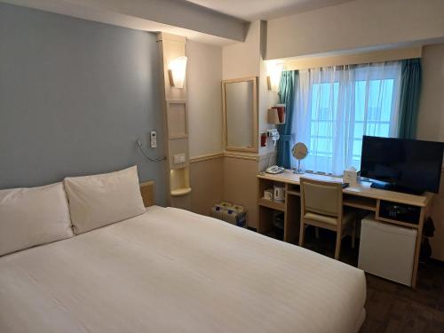 TV a/nebo společenská místnost v ubytování Toyoko Inn Ulsan Samsan
