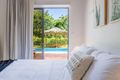 Katil atau katil-katil dalam bilik di Casa Callie- 3 Bedroom House With Pool