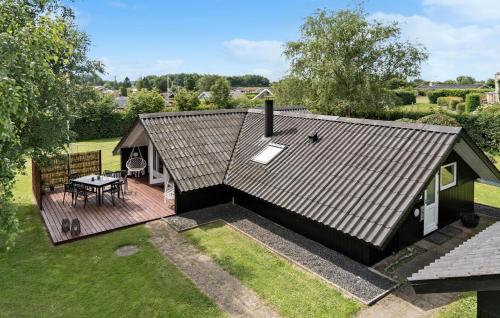 an overhead view of a house with a deck at Cozy Home In Hejls With Wifi in Hejls