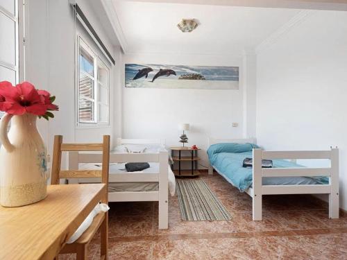 Postel nebo postele na pokoji v ubytování Spacious holiday home with private terrace