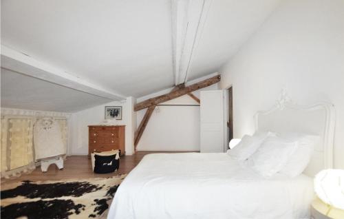 a white bedroom with a white bed and a dresser at Lovely Home In Pech-Luna With Wifi in Pech-Luna
