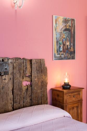 Postel nebo postele na pokoji v ubytování Dimora & Spa Il Cerchio di Lullo