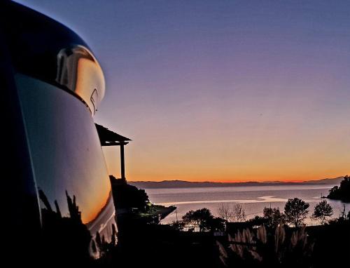 a view of the ocean at sunset from a boat at Lithanemon in Agnontas