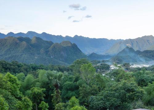 a view of a valley with mountains and trees at Gateway Inn Puluong in Pu Luong