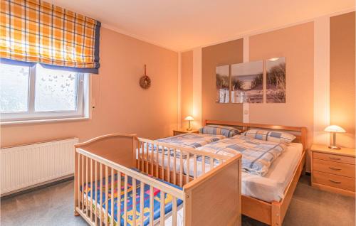 Postel nebo postele na pokoji v ubytování 2 Bedroom Nice Apartment In Fehmarn