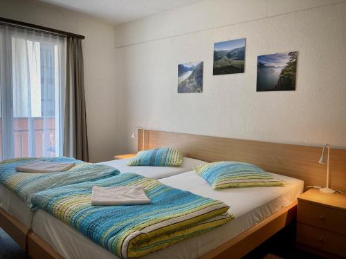 Postel nebo postele na pokoji v ubytování Hotel Waldhof
