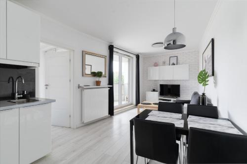 Dapur atau dapur kecil di Metro Wilanowska Aparts
