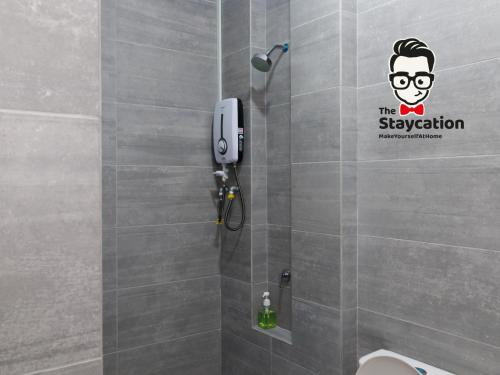 Ένα μπάνιο στο Staycation Homestay 53 Kuching Riverine Resort