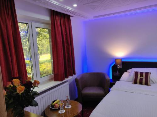 Postel nebo postele na pokoji v ubytování Hotel Eikenhof