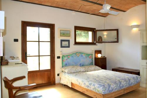 Ένα ή περισσότερα κρεβάτια σε δωμάτιο στο I Glicini Appartamento