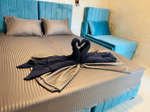 Postel nebo postele na pokoji v ubytování Neversea house