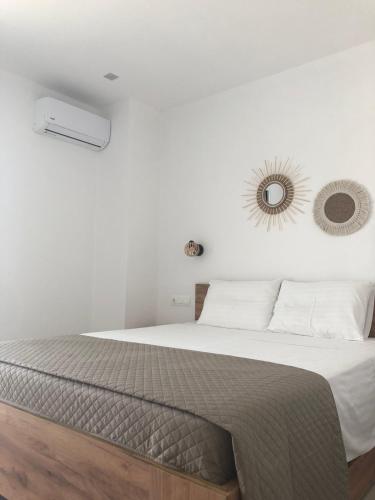 Ένα ή περισσότερα κρεβάτια σε δωμάτιο στο Fiosal Apartments 3