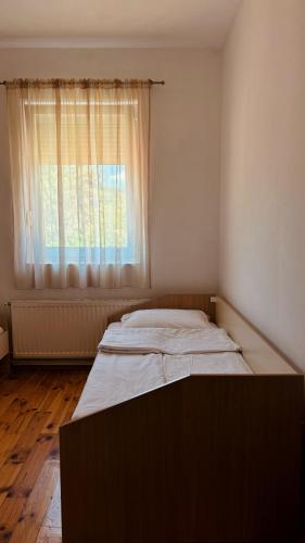 Postel nebo postele na pokoji v ubytování Stari grad