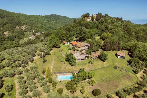 an aerial view of a house on a hill at Agriturismo La Sala in Greve in Chianti