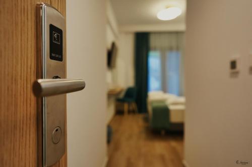 Ένα ή περισσότερα κρεβάτια σε δωμάτιο στο Electra Suites