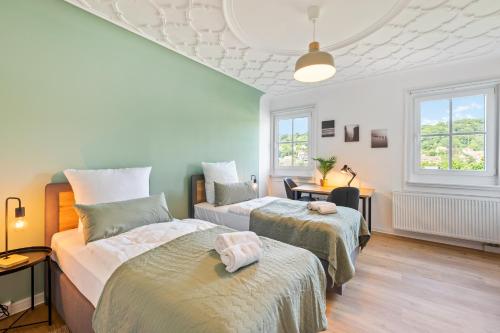 Ένα ή περισσότερα κρεβάτια σε δωμάτιο στο Sali Homes - Schwäbisch Hall, Altstadt #6