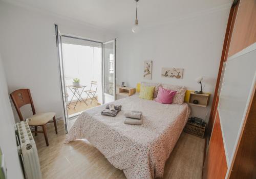 เตียงในห้องที่ Apartamento Estela Santander