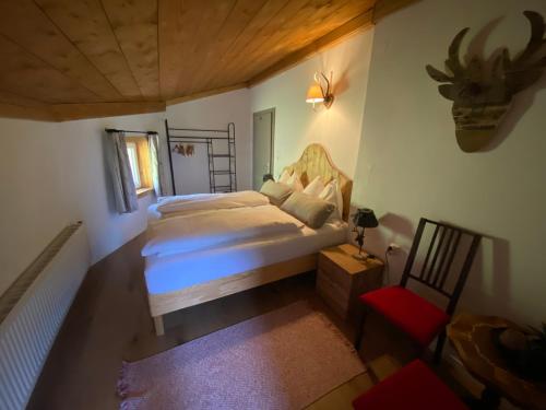 Postel nebo postele na pokoji v ubytování Haus Alpentraum