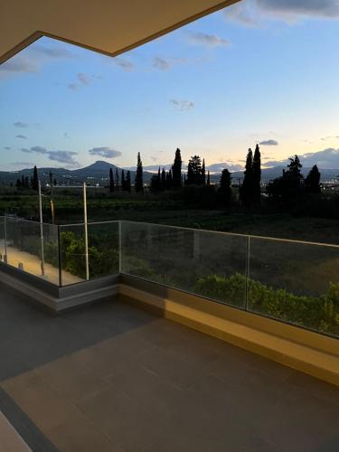 a view from the balcony of a house at Villa Maria Eirini in Lechaio