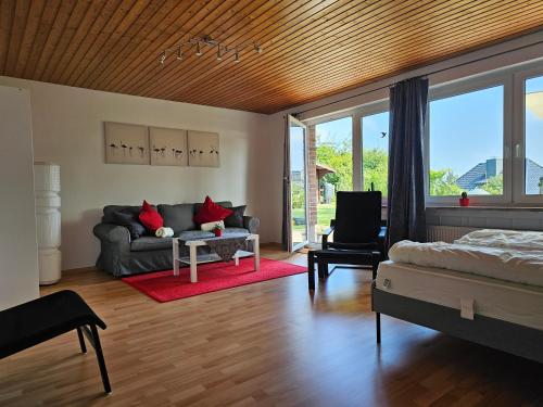 Postel nebo postele na pokoji v ubytování Ferienwohnung - Hitzacker - Tießau