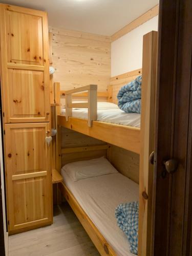 a bunk room with two bunk beds in it at Casa Bambi in Sella Nevea