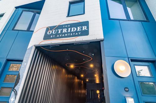 a building with a sign that reads the burauder of anxiety at The Outrider by AvantStay in Nashville