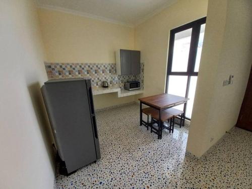 Cucina o angolo cottura di Guesthouse Jogja Selatan 1 Yogya South-Bantul Casa del Oceano