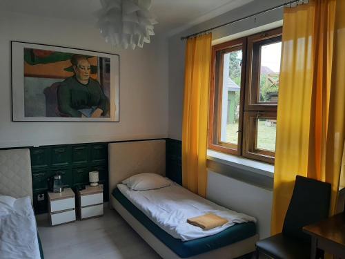 Postel nebo postele na pokoji v ubytování WILLA HONO LULU