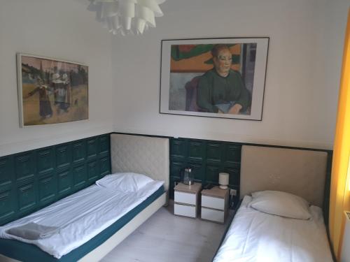 Postel nebo postele na pokoji v ubytování WILLA HONO LULU