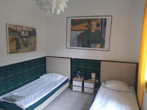 Postel nebo postele na pokoji v ubytování WILLA HONO LULU