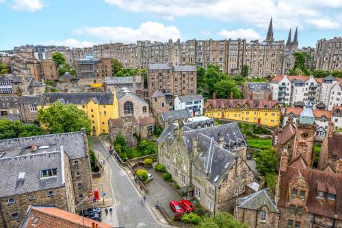 an aerial view of a city with tall buildings at The Old School in Dean Village in Edinburgh