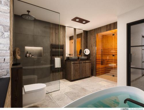 une salle de bain avec une baignoire, des toilettes et un lavabo dans l'établissement Tomtegl-Bergchalet-No-2-mit-Privatsauna-Infinitypool-Kamin-Fitnessraum-1500m-Seehoehe, à Hochrindl