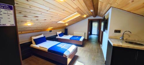Ένα ή περισσότερα κρεβάτια σε δωμάτιο στο Kibar Suite Hotel