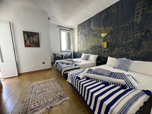 Una cama o camas en una habitación de HOTEL REGINA