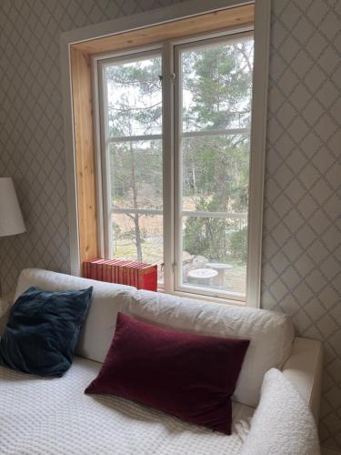 Una cama o camas en una habitación de Dunderbacken