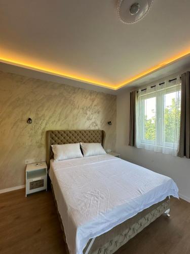 Postel nebo postele na pokoji v ubytování Apartman Igor