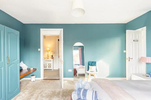 Postel nebo postele na pokoji v ubytování Station Road Homestay