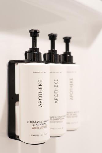 a group of three bottles of shampoo and conditioner at The Sagaponack in Sagaponack
